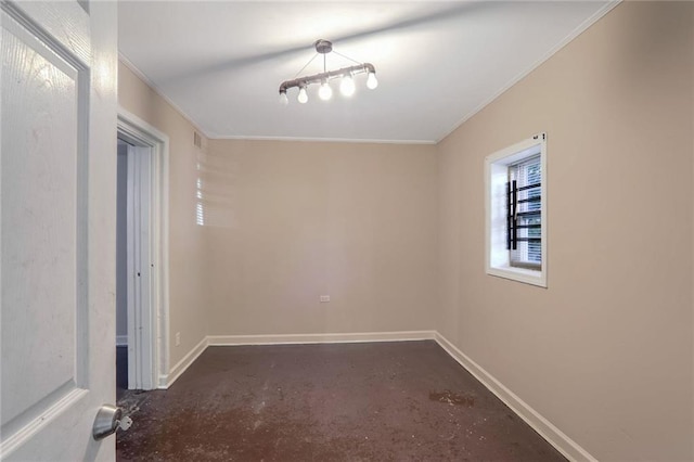 unfurnished room with ornamental molding