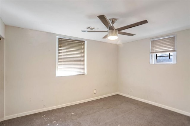 carpeted empty room with ceiling fan