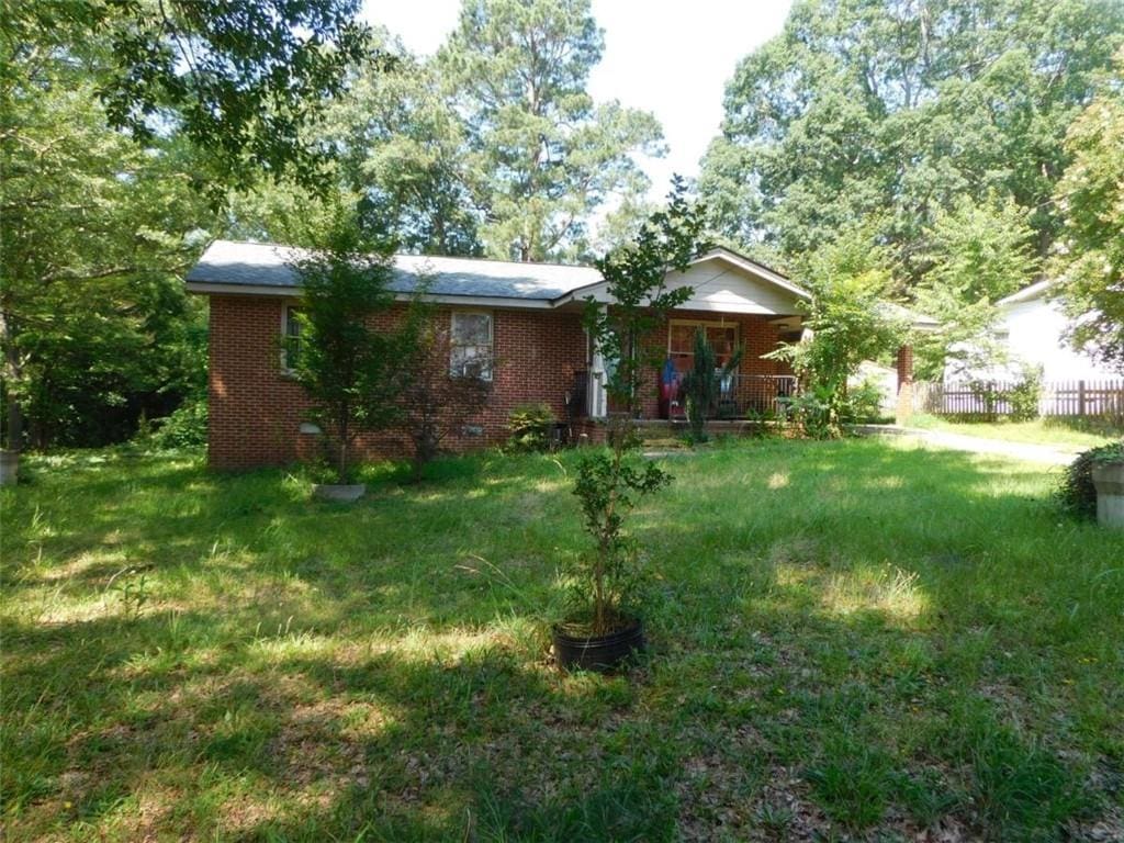 165 Shields St, Winder, GA 30680 - view of front of house featuring brick siding