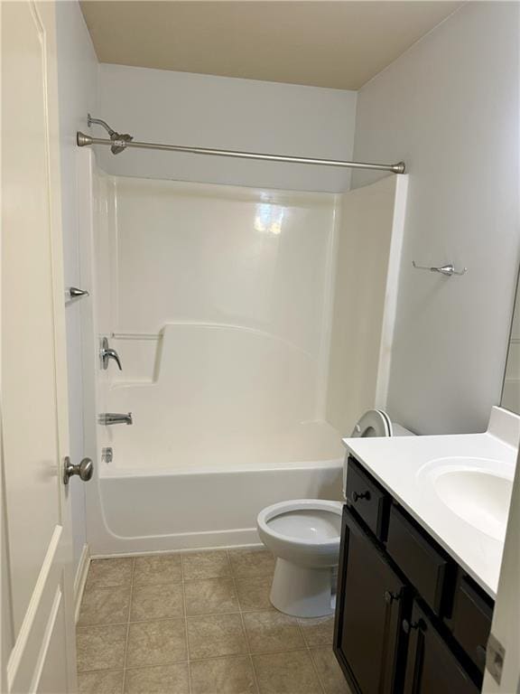 full bathroom featuring toilet, vanity, and shower / bathing tub combination