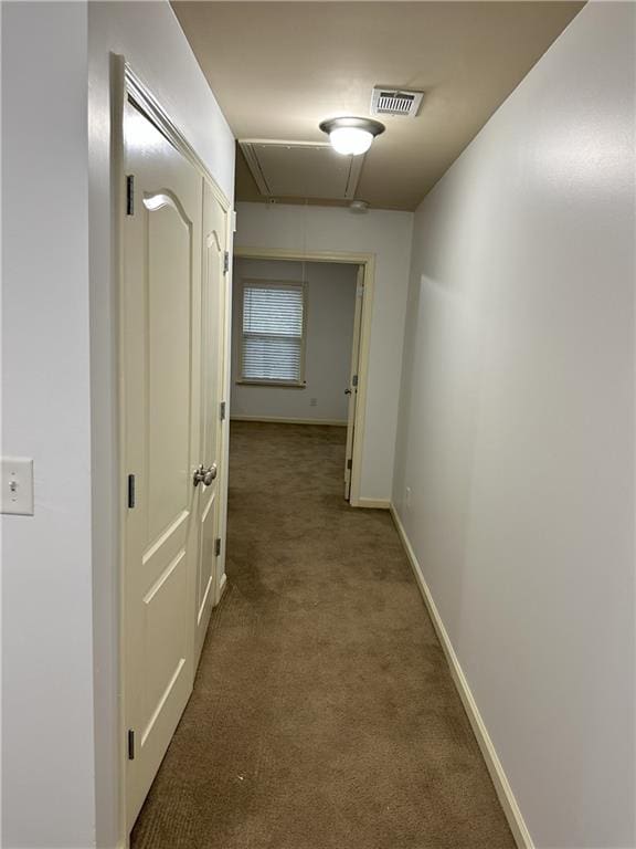 hall with carpet floors