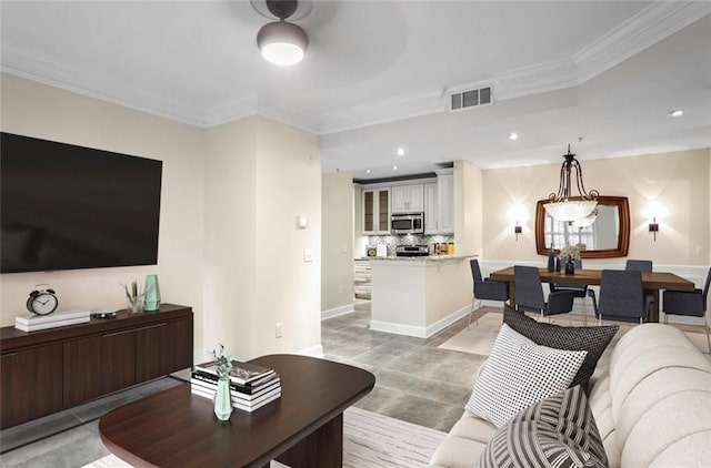 kitchen featuring decorative backsplash, sink, white cabinetry, and stainless steel appliances