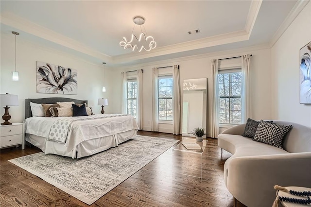2987 Jefferson St, Atlanta, GA 30341 - bedroom with a raised ceiling, ornamental molding, a chandelier, and dark wood-style flooring