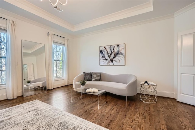 2987 Jefferson St, Atlanta, GA 30341 - living area featuring ornamental molding, wood finished floors, a raised ceiling, and baseboards