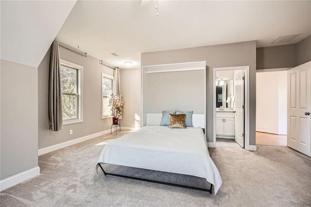 2987 Jefferson St, Atlanta, GA 30341 - bedroom featuring light colored carpet, baseboards, and ensuite bath
