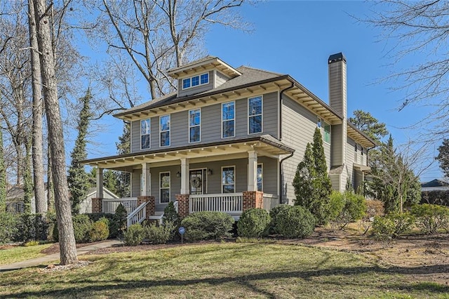 2987 Jefferson St, Atlanta, GA 30341 - american foursquare style home featuring covered porch, a chimney, and a front lawn