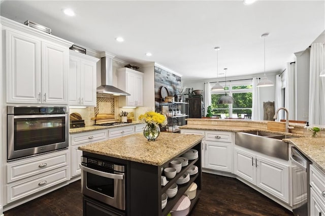 119 Sharp Mountain Crk, Ball Ground, GA 30107 - kitchen featuring stainless steel appliances, wall chimney range hood, open shelves, white cabinets, and recessed lighting