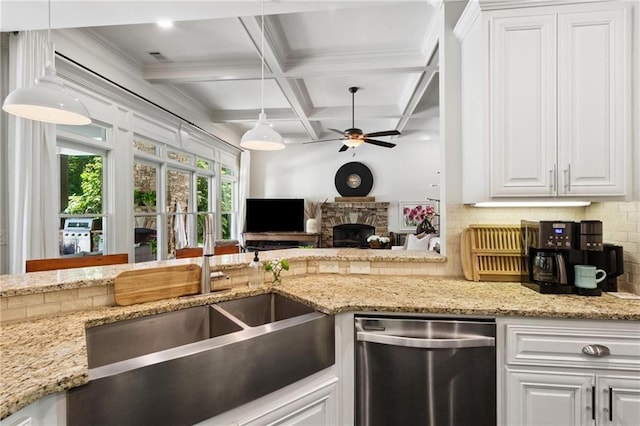 119 Sharp Mountain Crk, Ball Ground, GA 30107 - kitchen with stainless steel dishwasher, ceiling fan, tasteful backsplash, white cabinets, and beamed ceiling