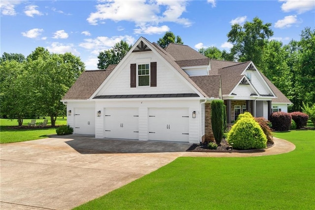 119 Sharp Mountain Crk, Ball Ground, GA 30107 - view of front facade featuring concrete driveway, a shingled roof, a standing seam roof, a front yard, and a garage