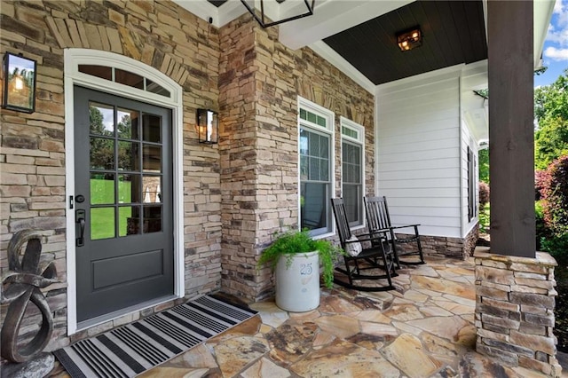 119 Sharp Mountain Crk, Ball Ground, GA 30107 - entrance to property featuring a porch and stone siding