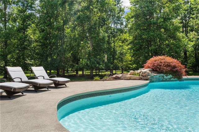 119 Sharp Mountain Crk, Ball Ground, GA 30107 - outdoor pool with a patio area