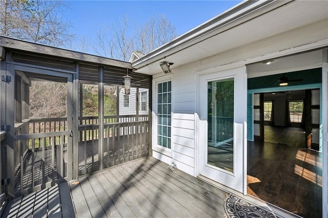 deck with a sunroom