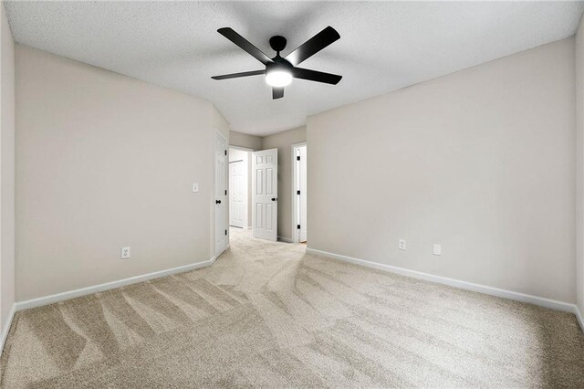 89 Prospect Path, Hiram, GA 30141 - carpeted spare room with baseboards, a ceiling fan, and a textured ceiling