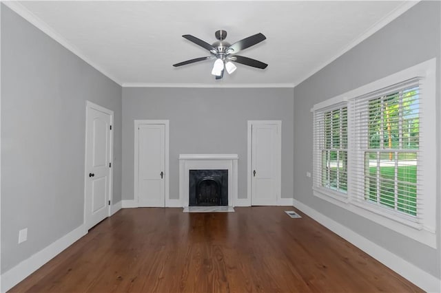 unfurnished living room with a fireplace with flush hearth, crown molding, visible vents, and baseboards