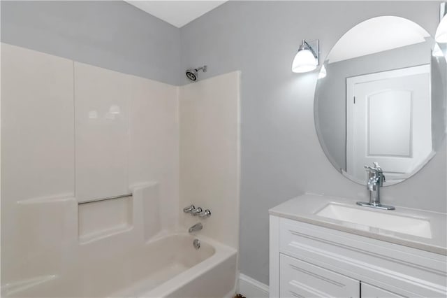 bathroom with washtub / shower combination and vanity