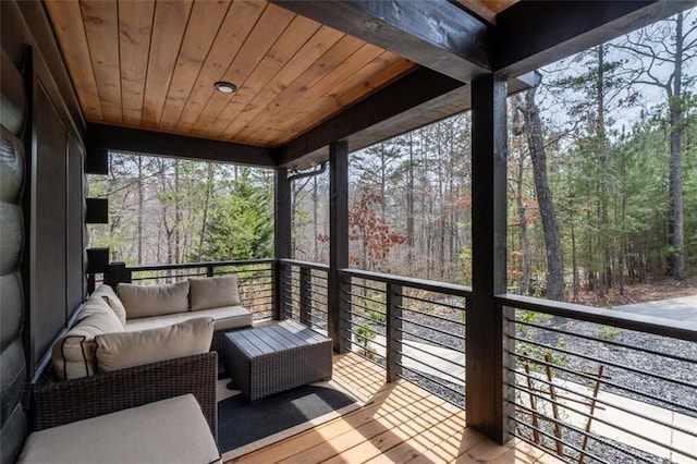 sunroom with wood ceiling