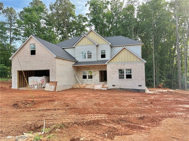 151 Tipton Ln, Acworth, GA 30102 - view of front of home with an attached garage, brick siding, and board and batten siding
