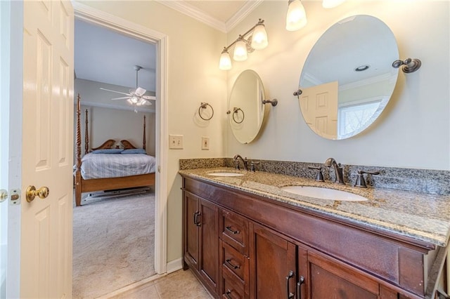 45 Somerset Ct, Covington, GA 30016 - bathroom with double vanity, ceiling fan, a sink, and crown molding