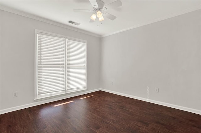 empty room with crown molding, ceiling fan, and dark wood-type flooring