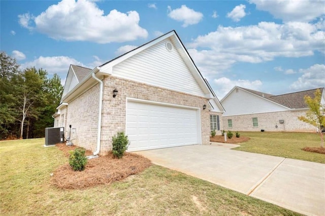 view of home's exterior with central air condition unit, a garage, and a lawn