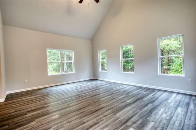 960 Park Place St, Social Circle, GA 30025 - spare room featuring high vaulted ceiling, a ceiling fan, baseboards, and dark wood-style floors