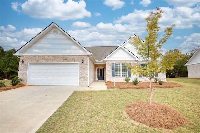 ranch-style house featuring a front yard and a garage