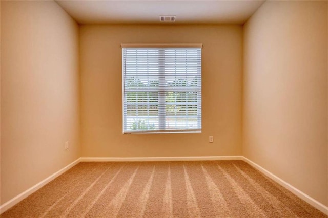 960 Park Place St, Social Circle, GA 30025 - spare room featuring carpet floors and baseboards