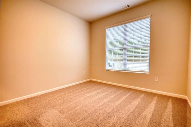 960 Park Place St, Social Circle, GA 30025 - spare room featuring carpet flooring and baseboards