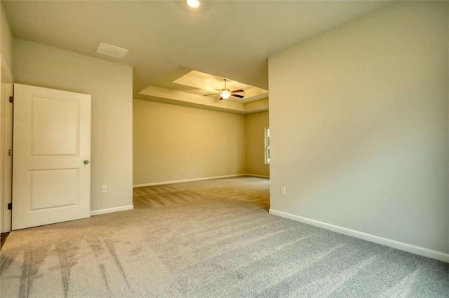 960 Park Place St, Social Circle, GA 30025 - carpeted empty room with baseboards, a raised ceiling, and ceiling fan