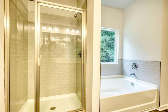 960 Park Place St, Social Circle, GA 30025 - bathroom with a stall shower and a bath