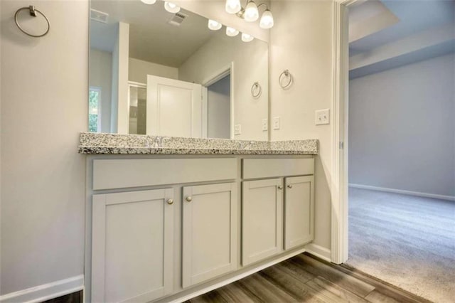 960 Park Place St, Social Circle, GA 30025 - bathroom with double vanity, baseboards, and a shower