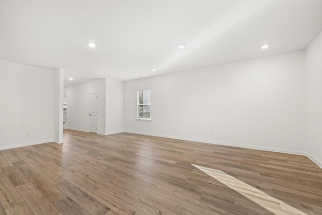 unfurnished room featuring light hardwood / wood-style flooring