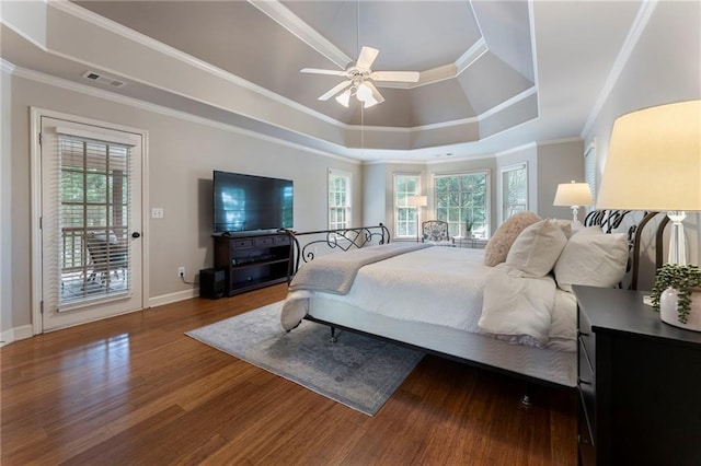 10135 High Falls Pointe Pointe, Johns Creek, GA 30022 - bedroom featuring access to exterior, a tray ceiling, wood finished floors, baseboards, and crown molding