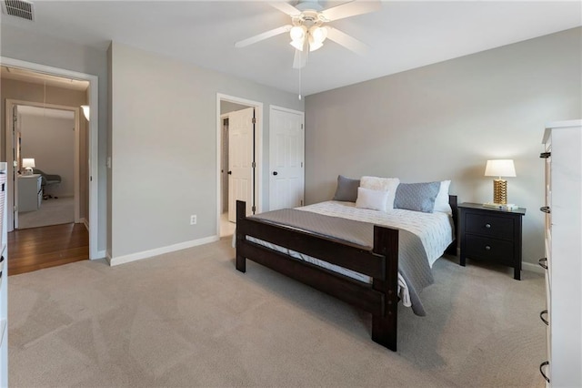 10135 High Falls Pointe Pointe, Johns Creek, GA 30022 - bedroom with light colored carpet, attic access, baseboards, and a ceiling fan