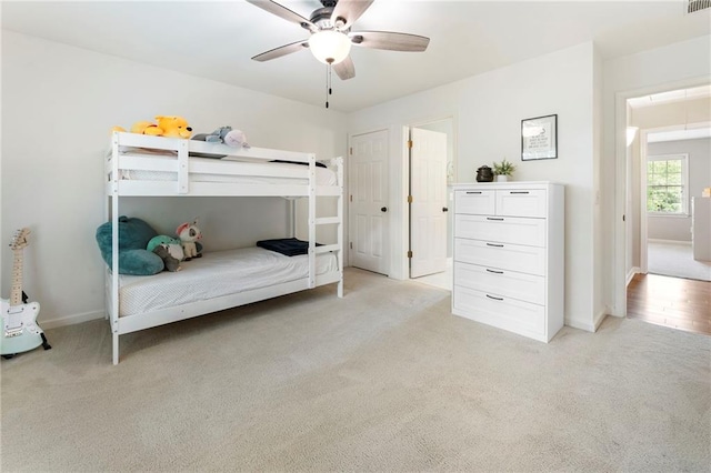 10135 High Falls Pointe Pointe, Johns Creek, GA 30022 - bedroom with light colored carpet, baseboards, and ceiling fan