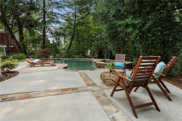 10135 High Falls Pointe Pointe, Johns Creek, GA 30022 - view of swimming pool with a patio area and a pool with connected hot tub
