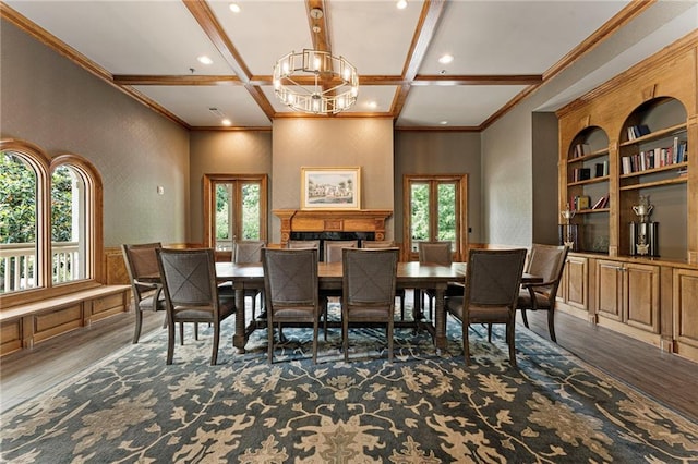 10135 High Falls Pointe Pointe, Johns Creek, GA 30022 - dining area with coffered ceiling, crown molding, wood finished floors, beam ceiling, and a chandelier