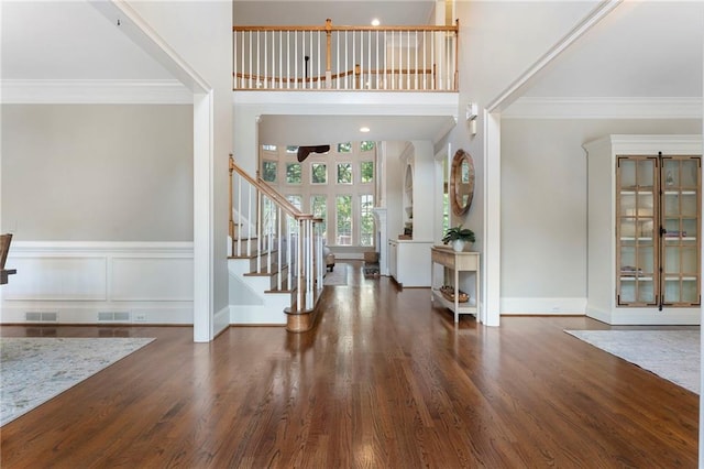 10135 High Falls Pointe Pointe, Johns Creek, GA 30022 - entrance foyer with stairs, ornamental molding, wood finished floors, ceiling fan, and baseboards