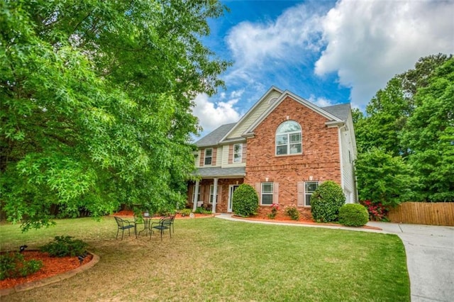 view of front of home with brick siding