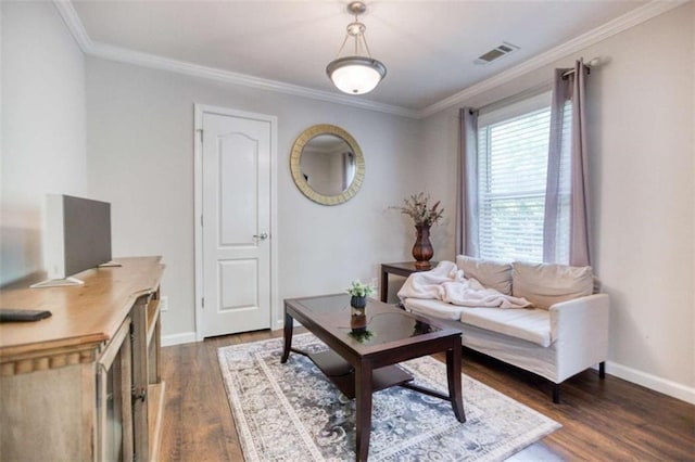 living room with ornamental molding, dark wood finished floors, and baseboards