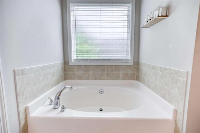 full bath with a garden tub