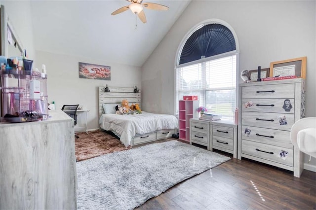 bedroom with lofted ceiling, wood finished floors, and a ceiling fan