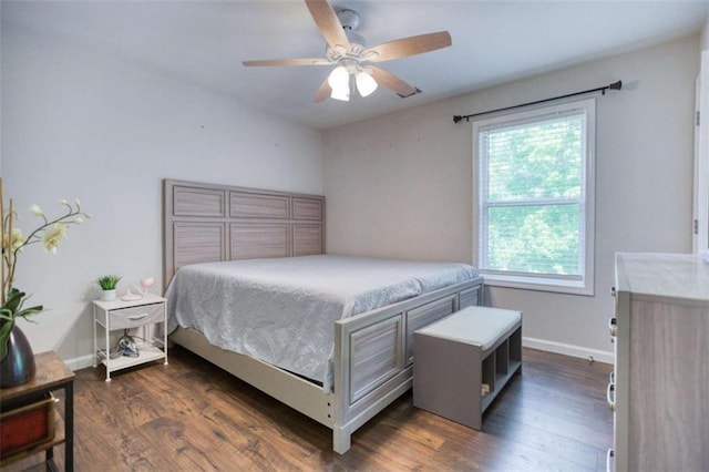 bedroom with dark wood-style flooring, baseboards, and ceiling fan