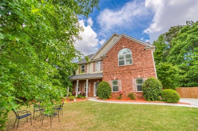 view of front of property with brick siding