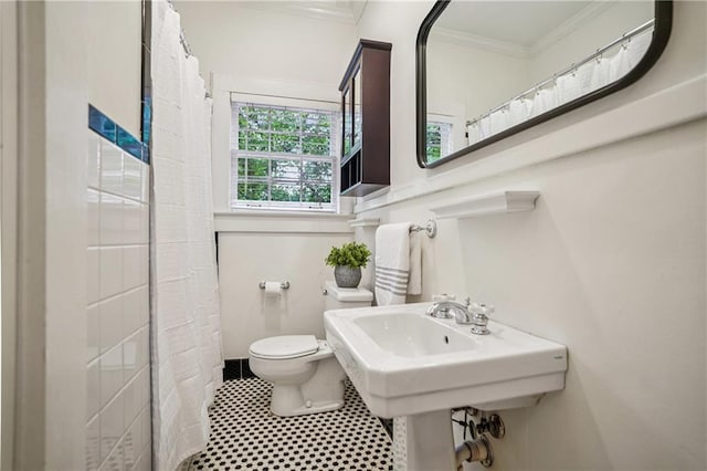 615 Sycamore Dr, Decatur, GA 30030 - bathroom with toilet, ornamental molding, and a shower with curtain