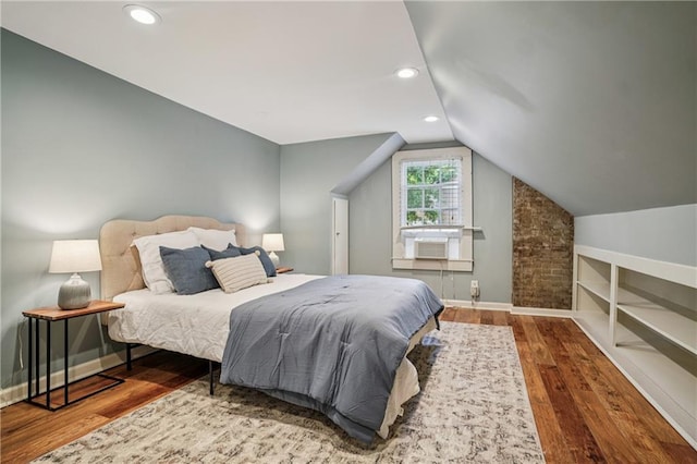 615 Sycamore Dr, Decatur, GA 30030 - bedroom featuring vaulted ceiling, wood finished floors, baseboards, and recessed lighting