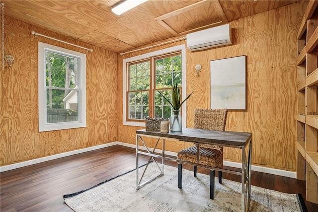 615 Sycamore Dr, Decatur, GA 30030 - office area featuring a wall unit AC, plenty of natural light, wooden walls, wood finished floors, and wooden ceiling