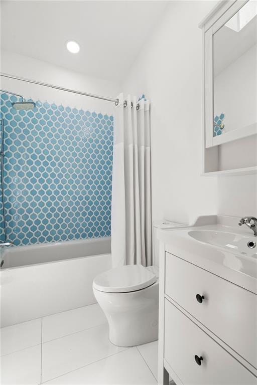 1492 Sagewood Cir, Stone Mountain, GA 30083 - bathroom featuring shower / tub combo, vanity, toilet, and tile patterned floors
