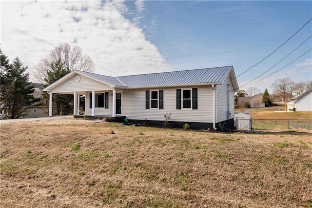 ranch-style home with a front lawn