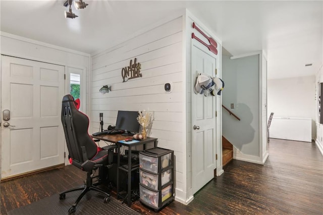 office with dark wood-type flooring and baseboards